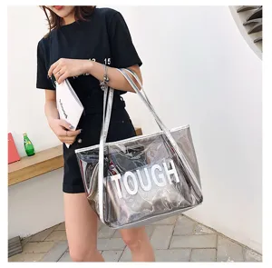 Stylish clear PVC tote bag with inner pouch, large capacity jelly shoulder bag for summer.