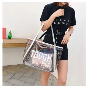 Transparent jelly tote bag with large capacity, stylish clear shoulder bag for beach summer use.