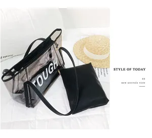 Detail view of transparent jelly tote bag with black inner pouch and stylish lettering design.
