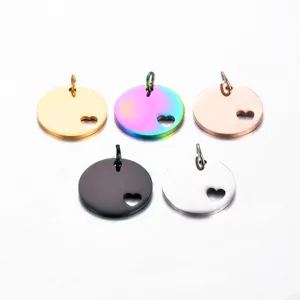 Stainless steel blank round pendant with hollow heart cutout for DIY jewelry making.