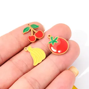Stainless steel fruit charms detail showing cherry banana and tomato enamel pendants.