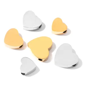 Perline distanziatrici a cuore in acciaio inossidabile dorato e argentato per gioielli fai da te.