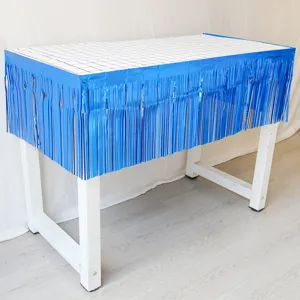 Blue foil fringe curtain detail shot, perfect for birthday party and wedding wall decoration.