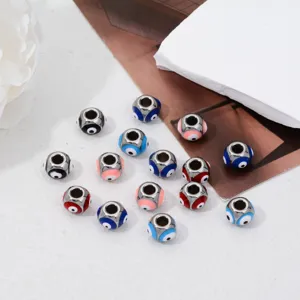 Close-up detail of stainless steel evil eye beads, colorful nazar charm jewelry accessories.