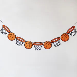 Basketball theme party banner detail view showing paper basketball and hoop decors.