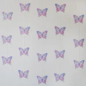 PVC laser butterfly garland hanging decor, party and birthday room decoration detail shot.
