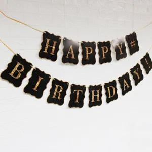 Black and gold glitter happy birthday banner for party decorations and celebration.