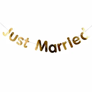 Gold foil Just Married letter banner for wedding party decoration and romantic celebration