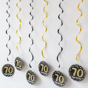 Detail display of black and gold 70th birthday hanging swirl party decorations set.