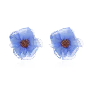 Handmade blue chiffon fabric flower stud earrings detail shot, elegant floral jewelry accessory.