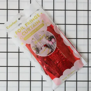 Red foil fringe curtain detail view, perfect for wedding party and birthday backdrop.