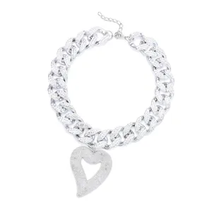 Rhinestone chunky Cuban link necklace with a large asymmetric heart pendant for women.