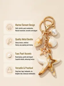 Close-up detail of a marine-themed keychain with starfish, seashell, and pearl charms