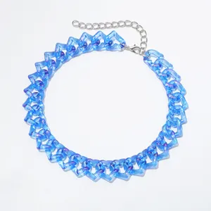 Close-up view of blue transparent acrylic heart link chain necklace, modern punk style detail.