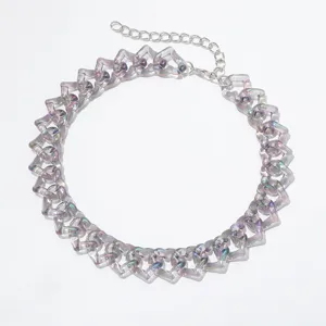 Detail view of a vintage colorful translucent heart acrylic choker necklace with metal chain.