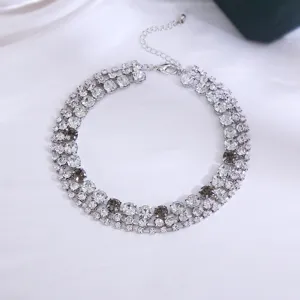 Detailed view of a multi-row crystal rhinestone choker necklace, elegant and exaggerated design.