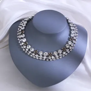 Stunning multi-row crystal rhinestone statement necklace for women, glamorous party jewelry.