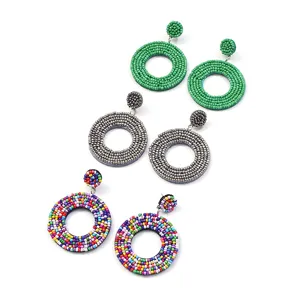 Boho handmade resin seed bead round hoop earrings in green, silver and colorful styles.