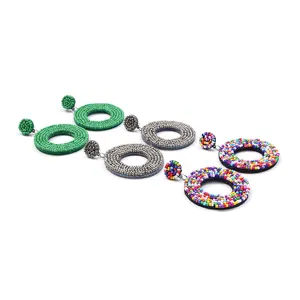 Handmade beaded circular earrings, bohemian retro resin earrings detailed showcase.