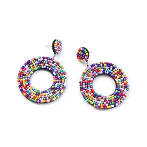 Handmade colorful seed bead circle earrings bohemian retro style detailed close-up view