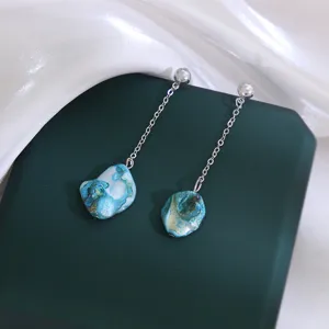 Lange blauwe natuursteen schelp ketting oorbellen minimalistische vakantie stijl.