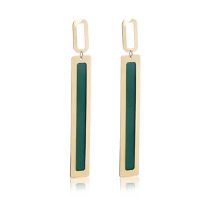 Detailed view of long geometric drop earrings, featuring a double-layer hollow design.