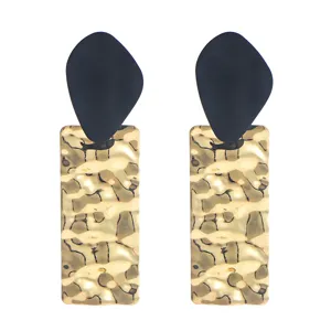 Gold crinkled rectangle earrings with matte black geometric stud, elegant long drop design for women.