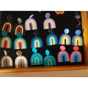 Handmade polymer clay rainbow earrings bohemian U-shaped geometric design detail view craftsmanship