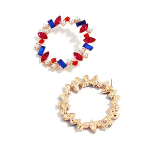 Vintage geometric round earrings featuring colorful crystals and pearls with gold tone back.