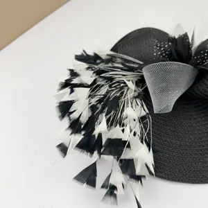 Vintage black and white feather fascinator hat mesh hair accessory for elegant party wear