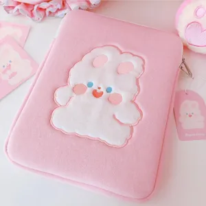 Pink fluffy bunny embroidery laptop sleeve detail, cute aesthetic tablet storage bag for daily use.