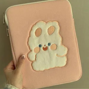Cute pink rabbit embroidered tablet sleeve, soft aesthetic laptop storage bag for daily use.