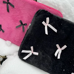 Cute plush laptop sleeve with bows aesthetic fluffy computer bag for women daily use.