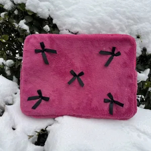 Pink fluffy laptop sleeve with cute black bows, soft plush notebook storage bag for women
