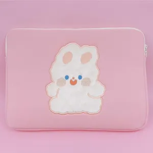 Pink cute plush tablet laptop sleeve bag with fluffy rabbit embroidery aesthetic design.