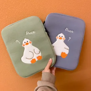 Cute duck embroidered iPad sleeve bag, soft protective tablet case for Apple, stylish laptop cover.