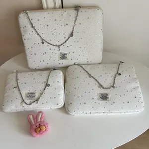 KAZUM stylish white laptop bag with star pattern, metal chain and cute plush decor for daily use.