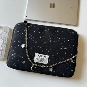 Black star print laptop sleeve with silver chain strap and moon pendant for iPad tablet.