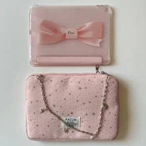 Pink ballet style iPad case and star pattern laptop sleeve set with chain strap detail.