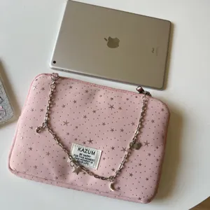 Pink cute star pattern laptop sleeve with chain strap and label, perfect for daily tablet storage.