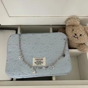 Light blue star quilted laptop sleeve with silver chain charm cute aesthetic tablet storage bag