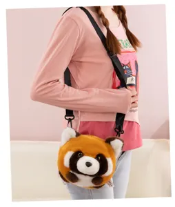Detailed shot of cute plush red panda crossbody bag worn by model, soft furry texture design.