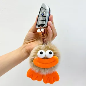Lindo llavero de pato de peluche pompón esponjoso colgante de bolso juguete suave y tierno
