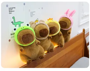 Cute hooded capybara plush toy detail, soft stuffed animal doll with funny animal hats.
