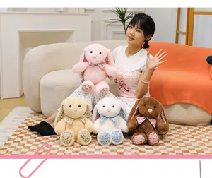 Cute floral long-ear plush bunny toy, soft stuffed animal doll, sweet room decor gift.