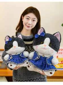 Plush cat toy with cute blue tweed dress and bow, soft stuffed animal doll for kids gift.
