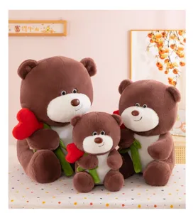 Simpatico orsetto di peluche marrone con rosa a cuore rosso, morbido cuscino da abbracciare.