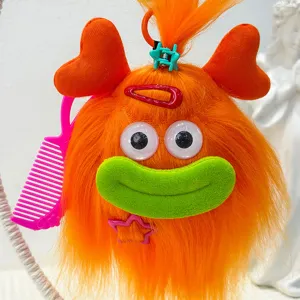 Cute fluffy orange monster keychain plush toy with big eyes and green mouth for bags and car keys