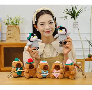 Cute crochet penguin and capybara plush keychain set, sweet bikini bag pendant for girls.