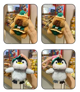Cute plush capybara and penguin keychain with crochet bikini outfit, sweet bag charm.
